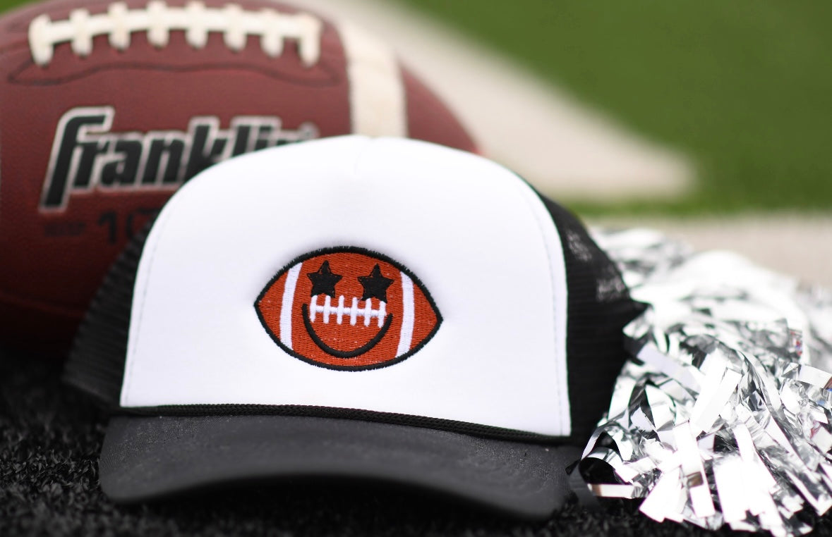 Starry Eyed Football Smiley black & white  trucker hat